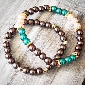 Coral, green, and brown beaded bracelets